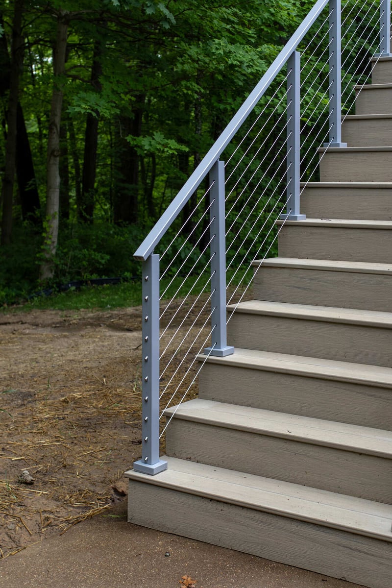 arola custom deck cable railing stair post front