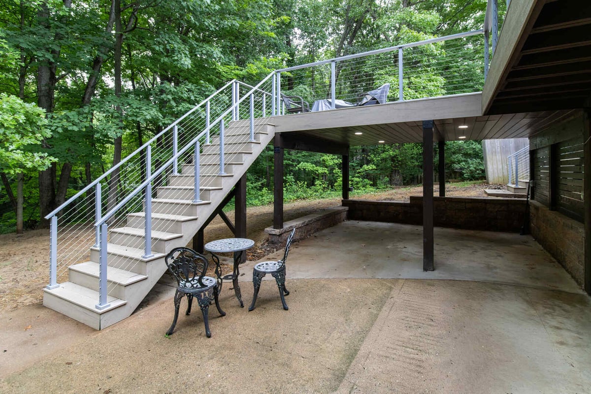 arola custom deck staircase down to bistro table patio