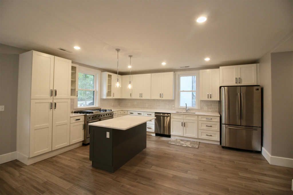 Full kitchen renovation in Lafayette, IN with stainless appliances and neutral color palette by S. Brown Construction Co.