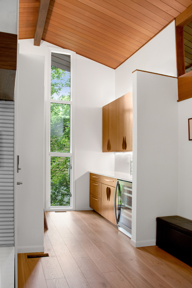 Tall ceilings and natural wood cabinetry in custom kitchen nook by S. Brown Construction Co. in Wildcat Creek, IN.