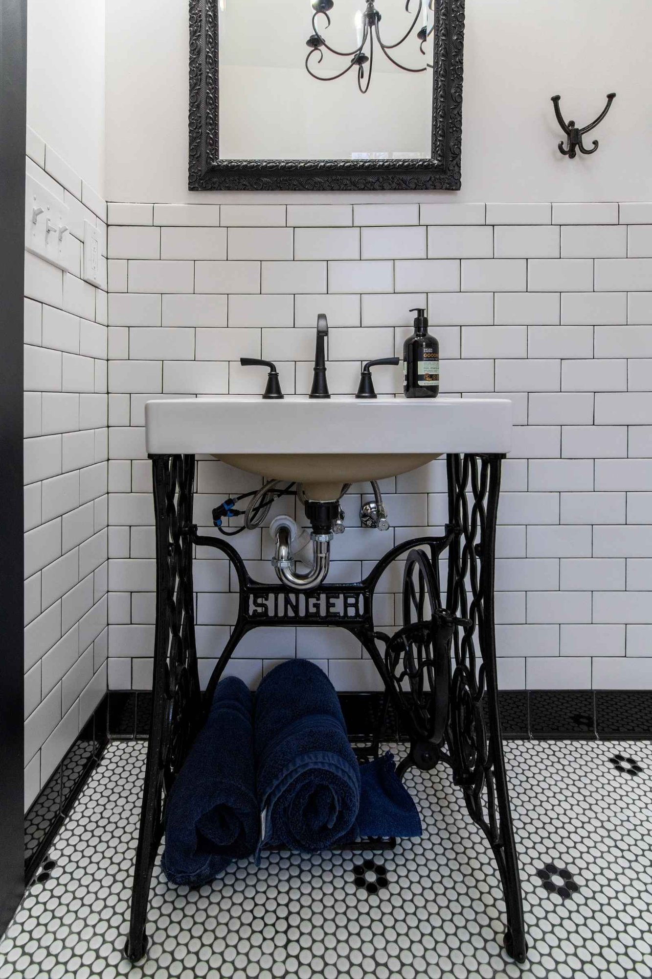custom bathroom vanity with metal base sink by S. Brown Construction Co. West Lafayette IN