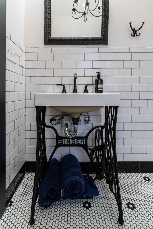 custom bathroom vanity with metal base sink by S. Brown Construction Co. West Lafayette IN