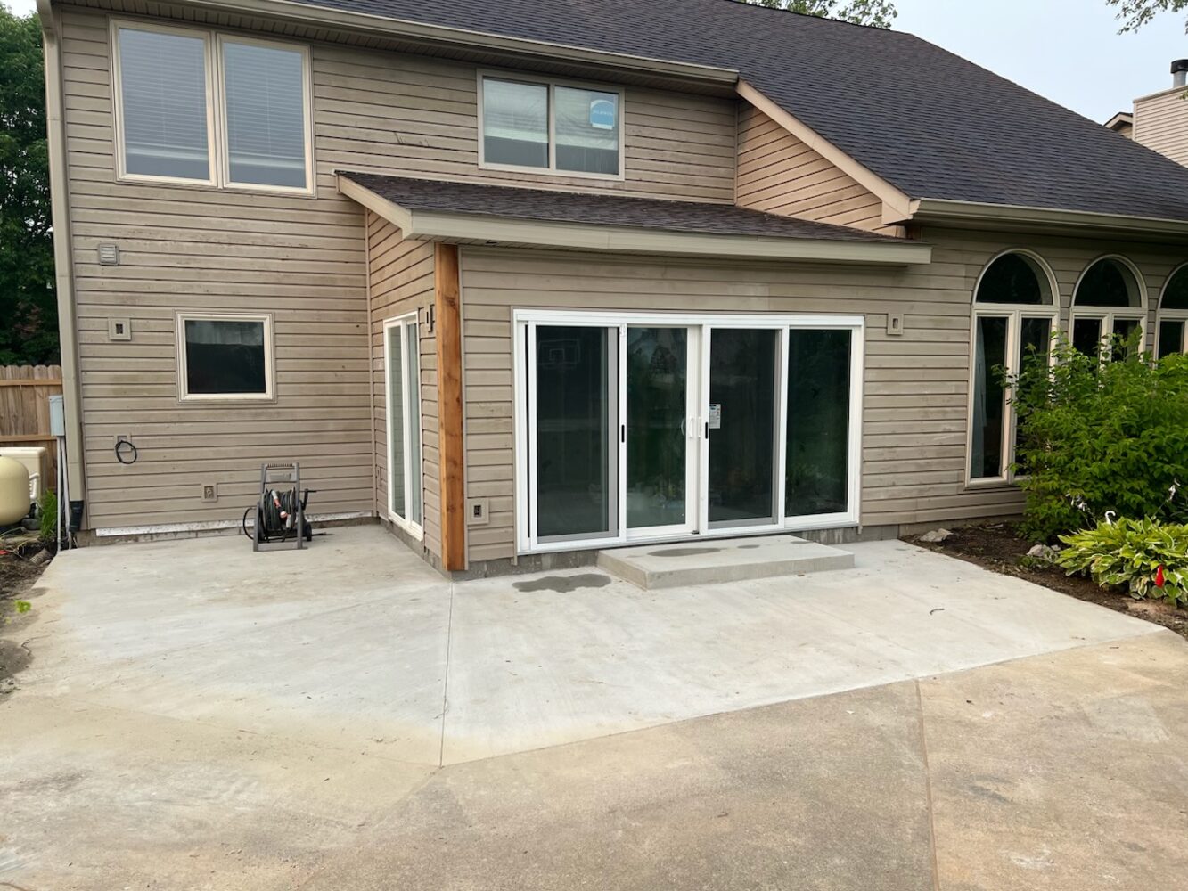 Sunroom addition with new sliding glass doors by S. Brown Construction Co. in Raineybrook, IN.