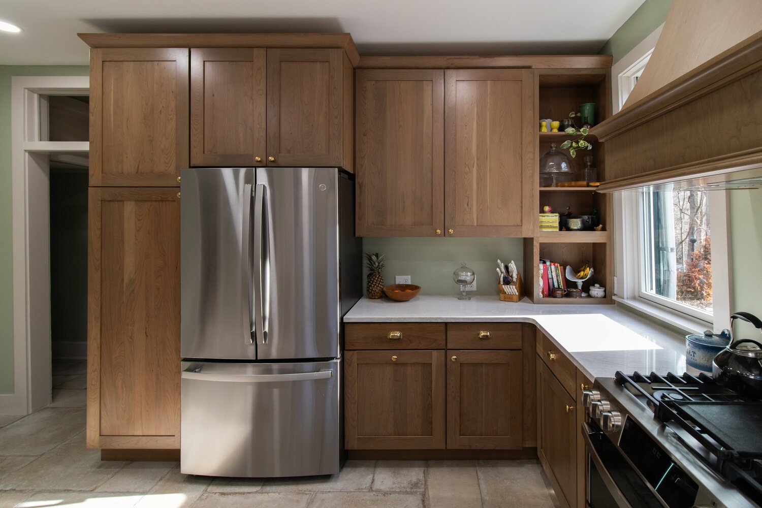 Elegant custom kitchen cabinetry in Arbor Chase, IN home remodeled by S. Brown Construction Co.