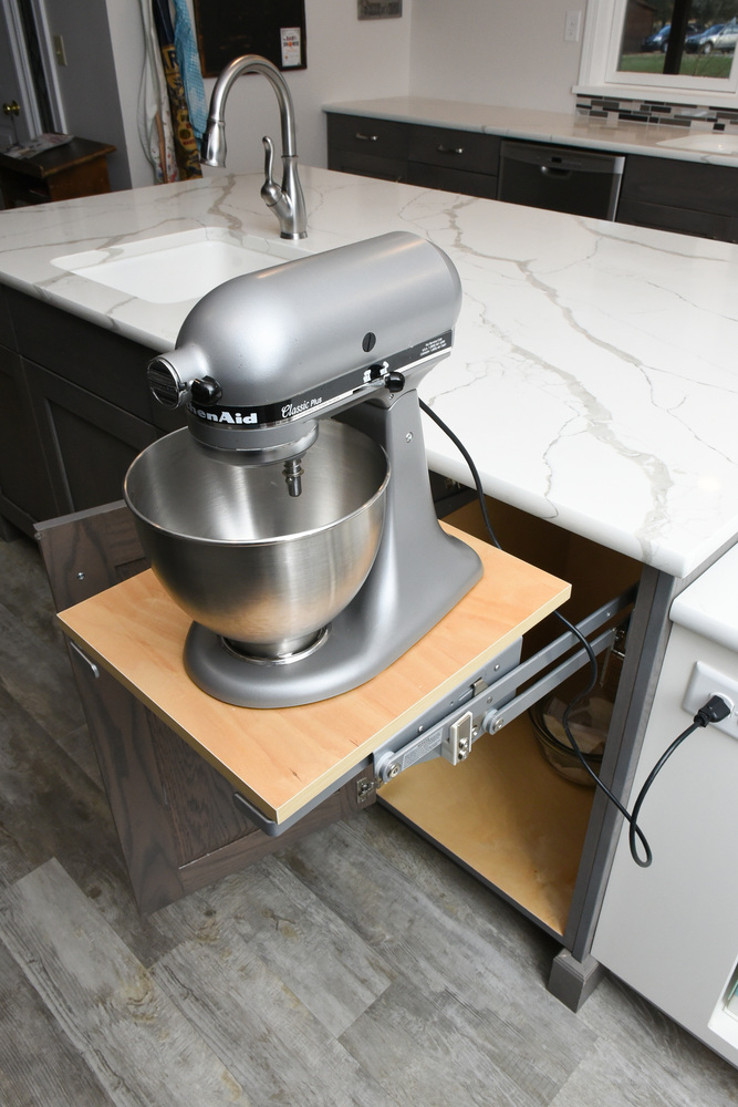 Hidden mixer lift cabinet installation in University Farm, IN kitchen remodel by S. Brown Construction Co.
