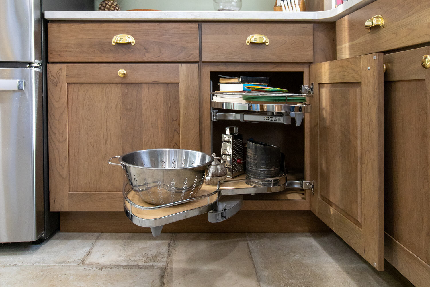 Smart cabinetry with pull-out shelves in custom kitchen project by S. Brown Construction Co. in Lafayette, IN.