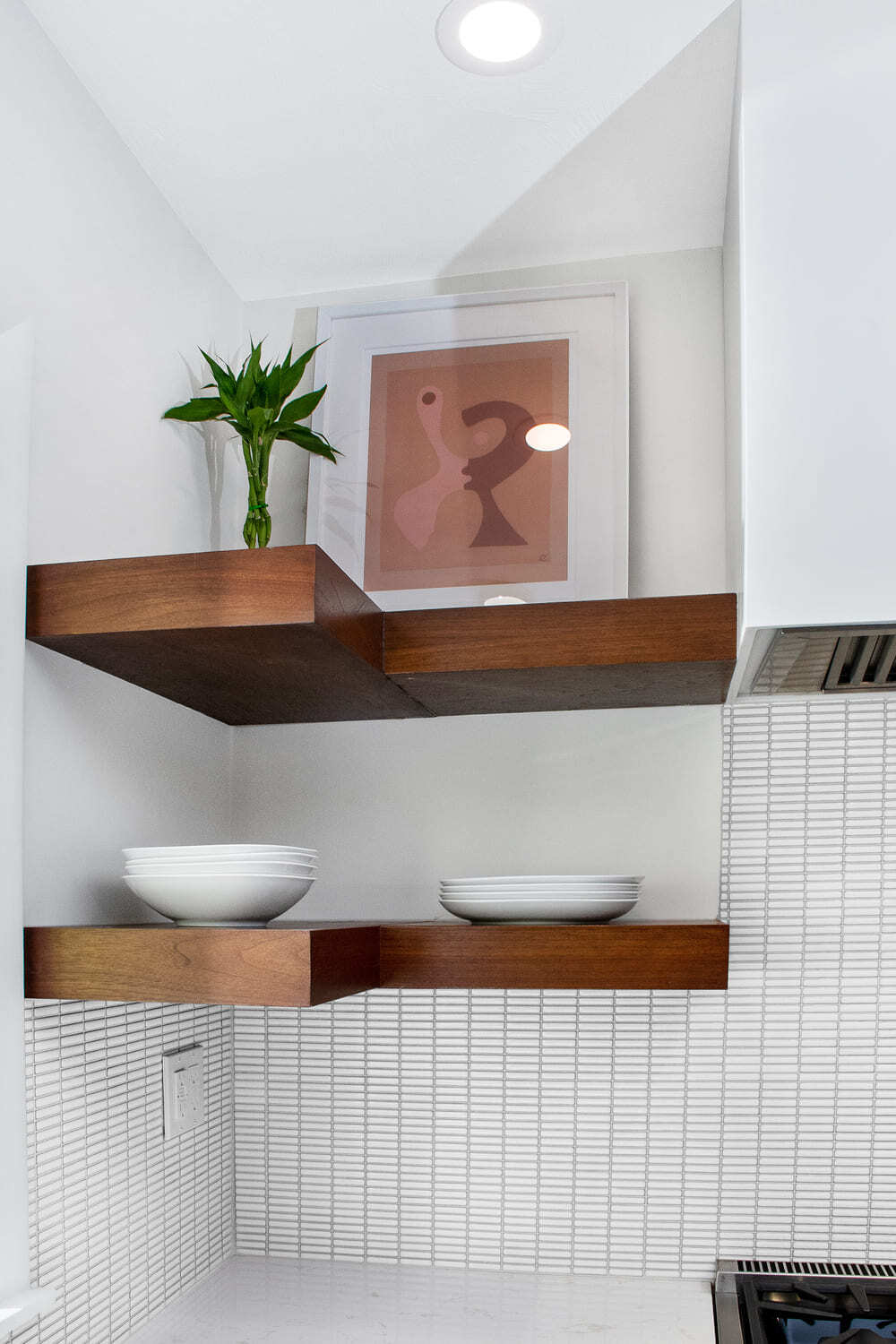 Corner floating shelves with tile backsplash in Lafayette kitchen remodel