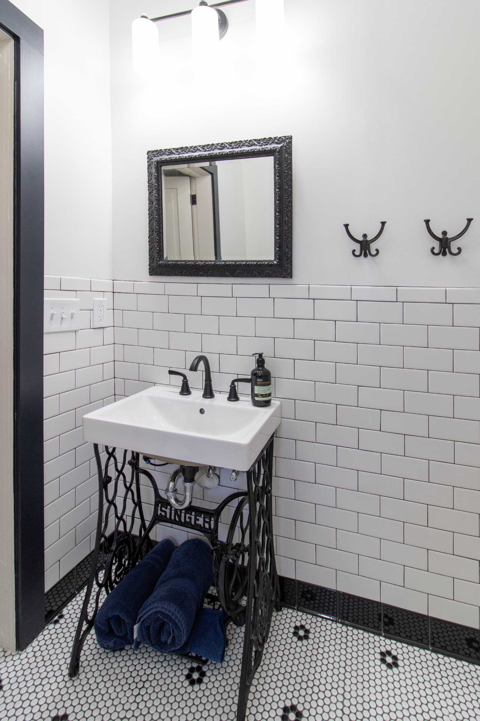 bathroom remodel with vintage sink vanity and subway tile by S. Brown Construction Co. Lafayette IN