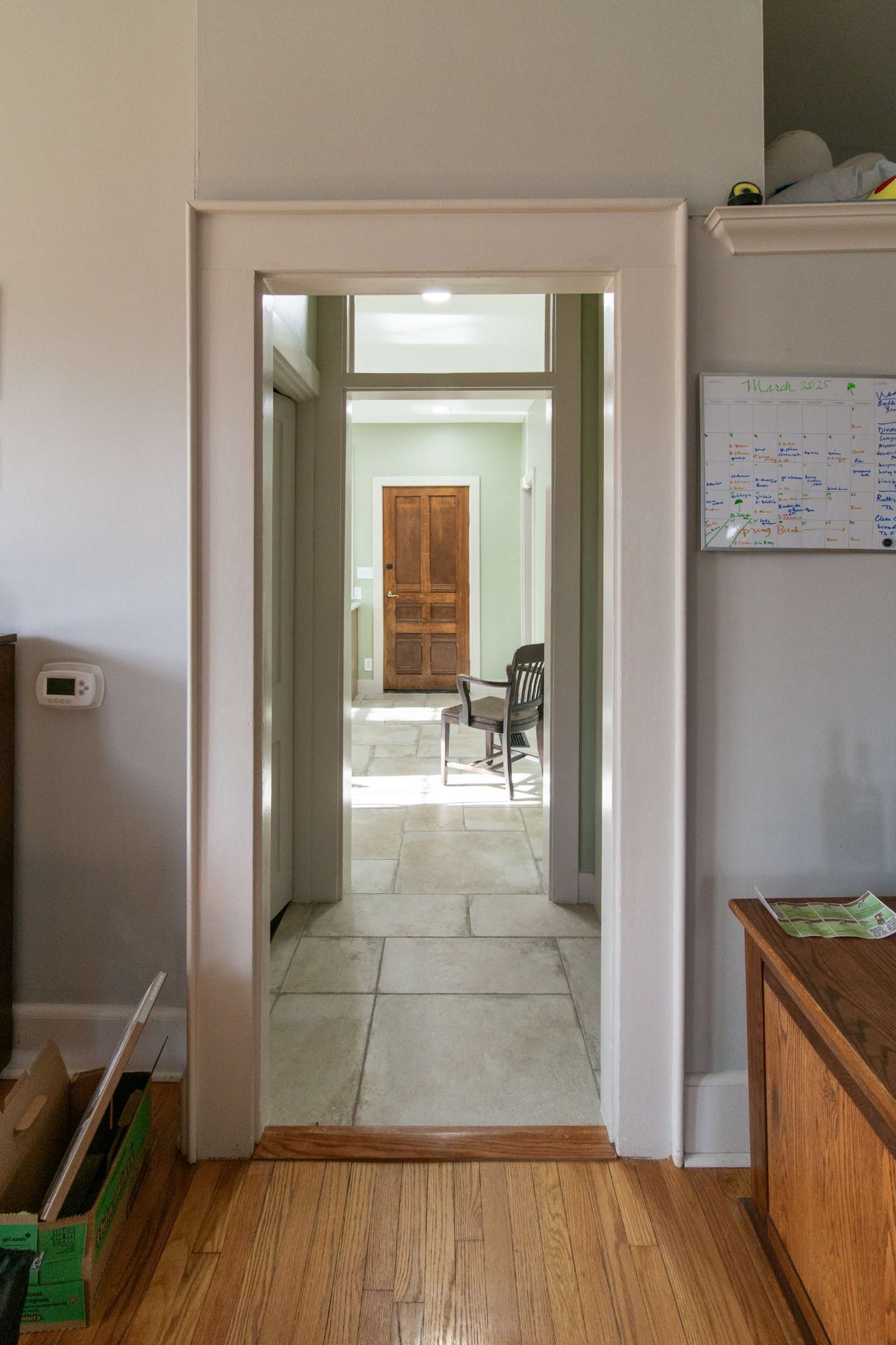 home interior remodel showing hallway transition and tile flooring by S. Brown Construction Co. Lafayette IN