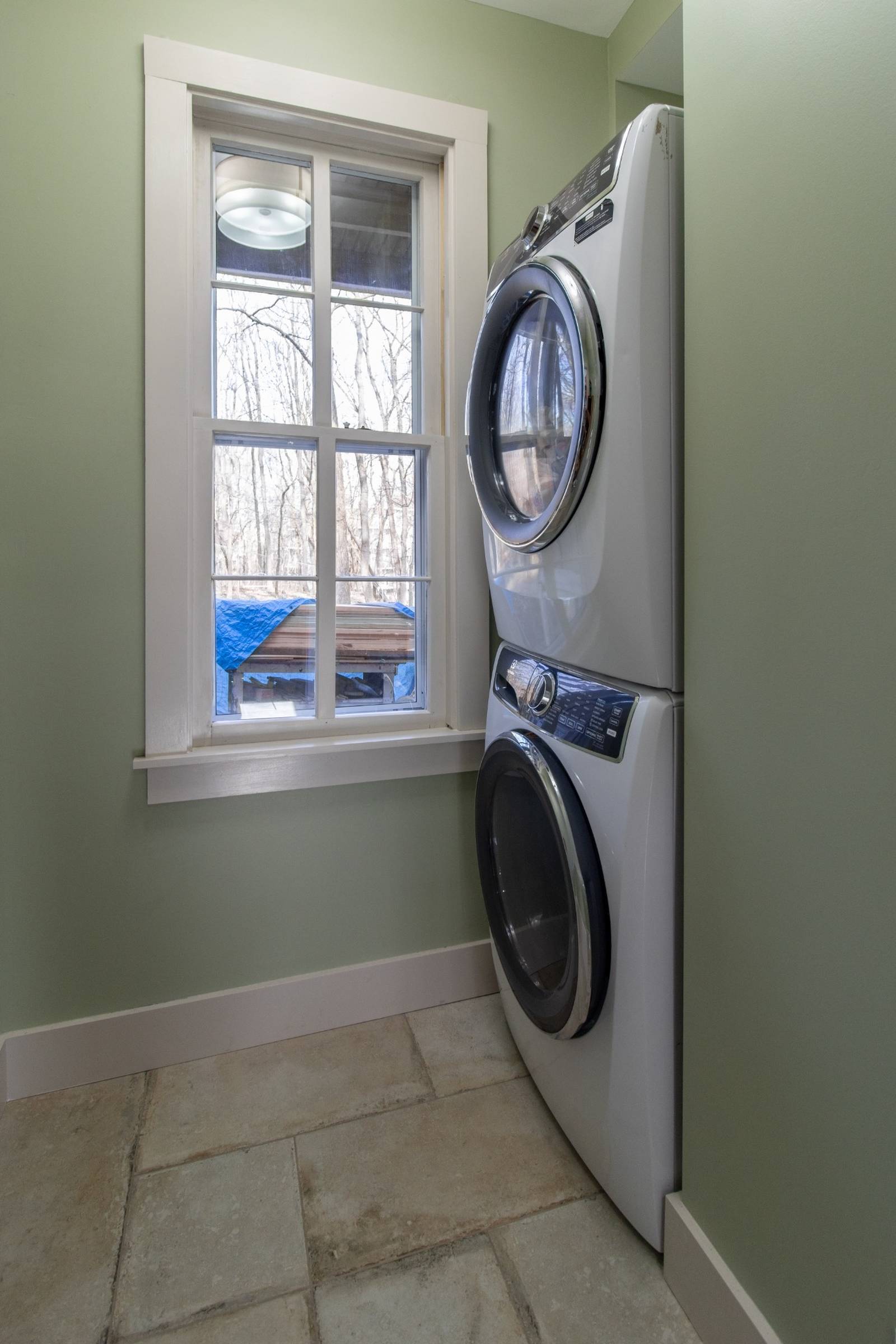 laundry room remodel with stacked washer and dryer by S. Brown Construction Co. in Lafayette IN