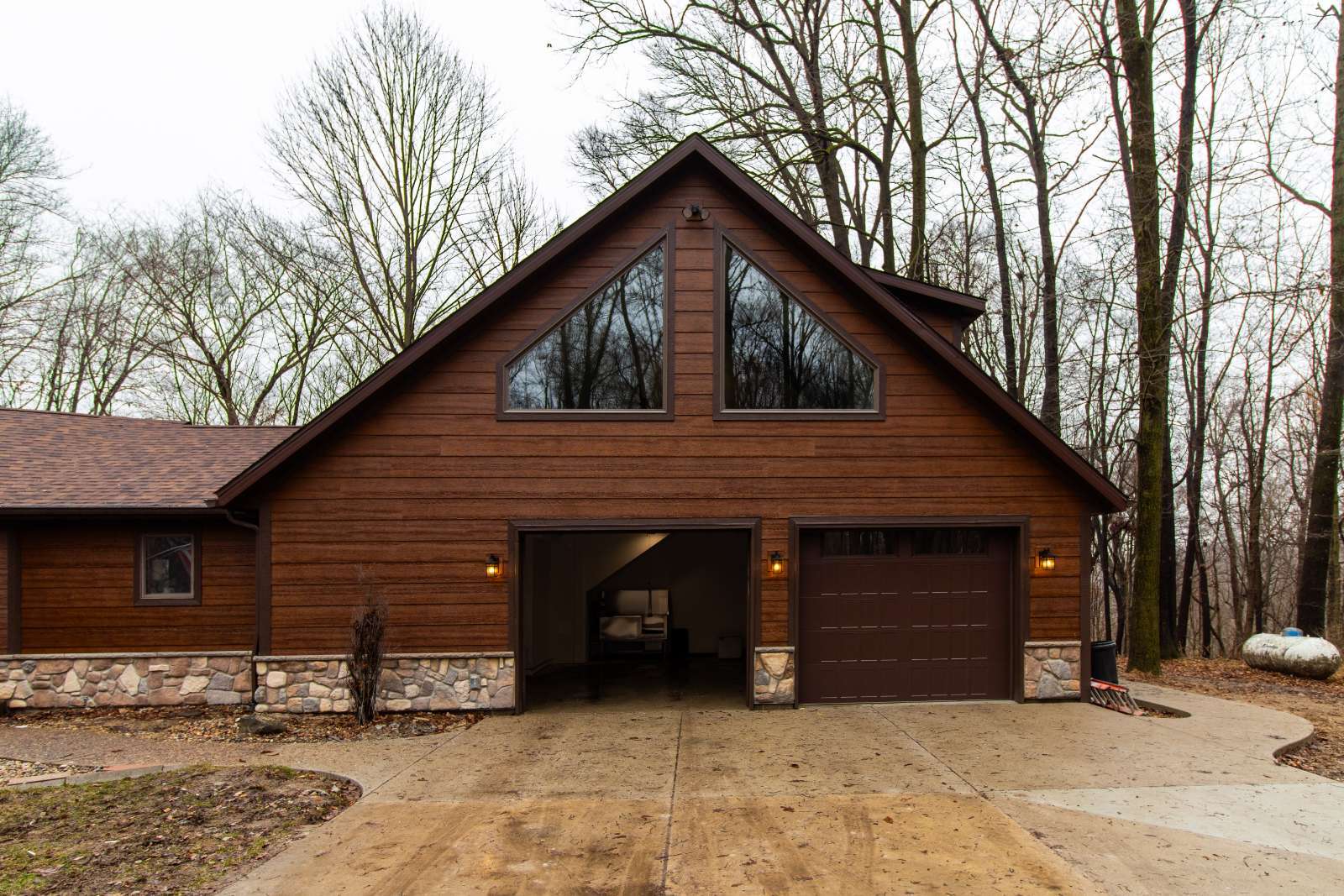 Front elevation of the Schoon Garage Addition featuring custom wood siding by S. Brown Construction Co. in Lafayette, IN.