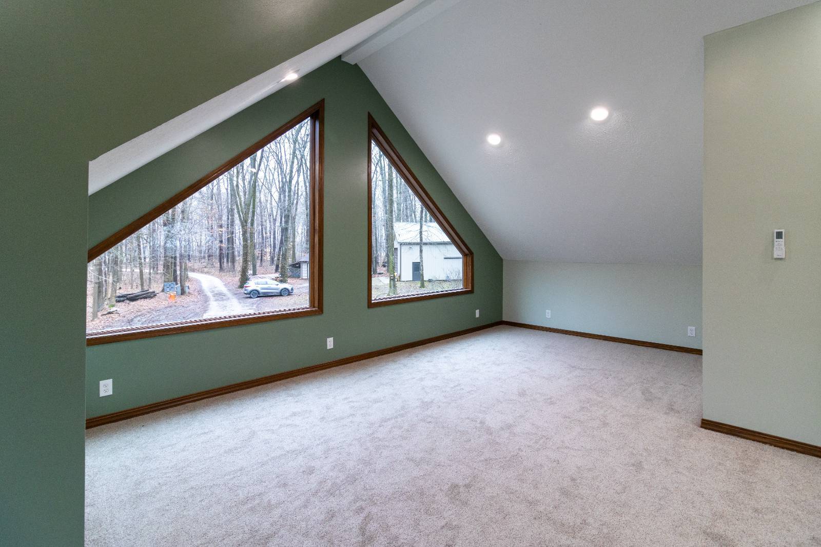 bonus room with oversized custom windows completed by S. Brown Construction Co. in Lafayette, IN.-optimized