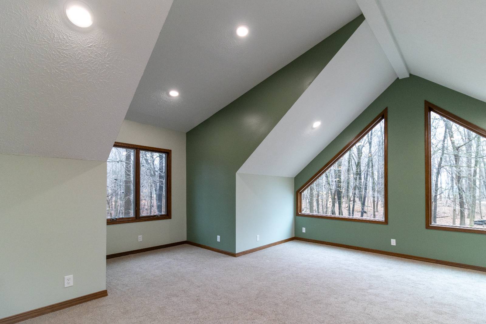 finished bonus room with dramatic window wall completed by S. Brown Construction Co. in Lafayette, IN.-optimized finished bonus room with dramatic window wall completed by S. Brown Construction Co. in Lafayette, IN.-optimized